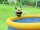SunClub Planschbecken Wassersprühender Bienen Pool Ø 150 x 41 cm mit aufblasbarem Luftring